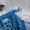 Haftowany sweter w paski o luźnym Fit-u Haftowany sweter w paski o luźnym Fit-u