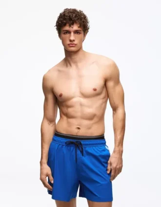 Kropkowane kąpielówki o luźnym kroju z podwójnym paskiem – Akcesoria